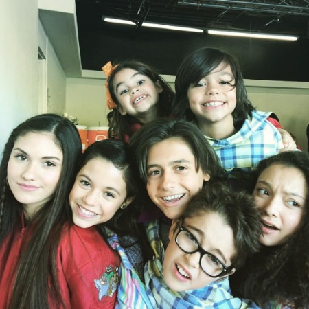 Ariana Greenblatt and Malachi Barton with other fellow actors.